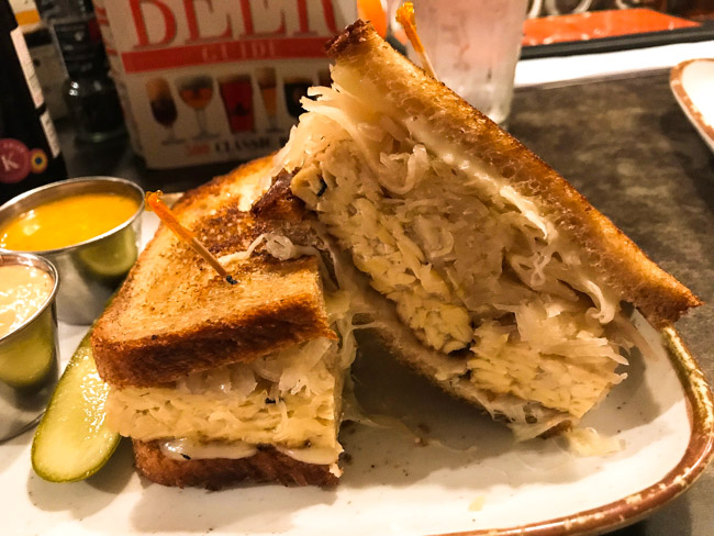 The Tempeh Reuben from Mudgie's Deli in Detroit, MI is a vegan's dream! Hearty, briney, and delicious. 